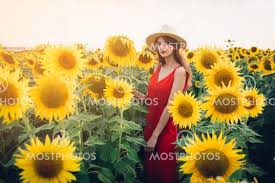 Woman With Red Dress In Sun By