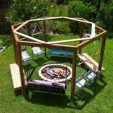 These swings around a campfire is a diy project that will transform your entire backyard! Pergola With Swings And Fire Pit Novocom Top