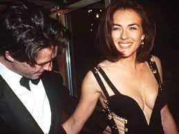 Elizabeth hurley got glammed up to enjoy her first night out in over a year. Hugh Grant Liz Hurley Only Wore Versace Safety Pin Dress Because She Was Snubbed By Other Designers The Independent The Independent