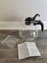 vintage glass whistling tea kettle
