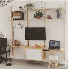 svalnas shelves with tv and laptop