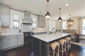 Decorative elements like lighting, tile and hardware can really change the tone and overall style of a kitchen. A Grey Shaker Style Kitchen Has Timeless Versatile Appeal