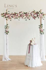 Flower arranging has been a popular art for centuries, and many people consider the ability to create a perfectly balanced arrangement a great skill. Home Decor For Wedding Ceremony Aobor And Reception Backdrop Floral Arrangement Decor Set Of 3 Lings Moment Artificial Flower Arch Decor With Sheer Drape Home Kitchen