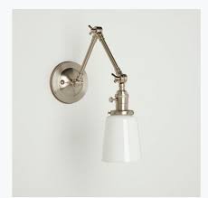 wall sconce with milk glass cup shade