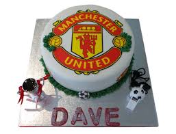 Write wishes on socola birthday cake. Manchester United Birthday Cake
