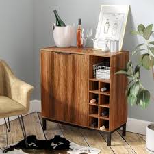 Build a frame around a prefinished upper cabinet and a mini fridge with inexpensive stock lumber to create this custom piece of furniture in a few hours. Dry Bar Cabinet Wayfair
