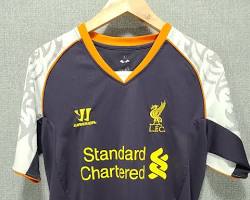 Image of Liverpool's orange and white jersey