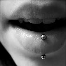 stylish vertical labret piercing