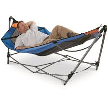 This blue portable hammock bed offered by stalwart is convenient, foldable and perfect if you are going camping. Guide Gear Oversized Portable Folding Hammock Blue Orange 350 Lb Capacity 677549 Camping Hammocks At Sportsman S Guide