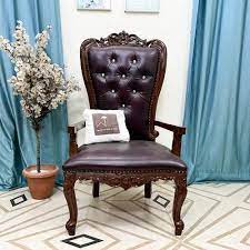 luxurious hand carved high back throne