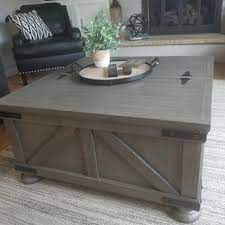 Signature design by ashley aldwin gray collection. Aldwin Coffee Table With Lift Top Ashley Furniture Homestore