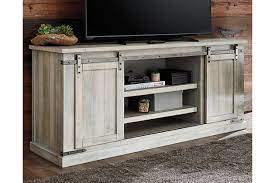 Shop target for tv stands and entertainment centers in a variety of sizes, shapes and materials. Carynhurst 70 Tv Stand Ashley Furniture Homestore