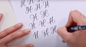 write letter h in brush calligraphy