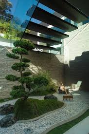 Zen Garden Under Floating Stairs
