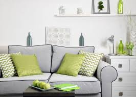 four sage green and grey living room