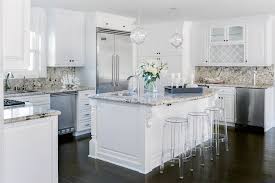 white kitchen cabinets with tan granite