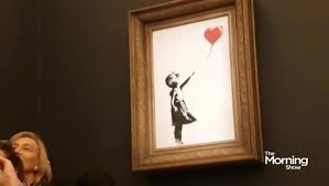 On friday night, a painting by the anonymous street artist known as banksy sold at sotheby's auction house in london for $1.4 million. Banksy Says His Auctioned Painting Should Have Shredded All The Way Through National Globalnews Ca