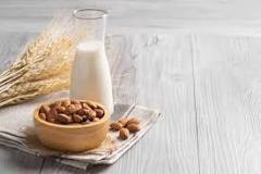 What is the side effect of almond milk?