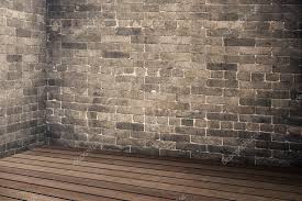 Empty Brick Wall And Wood Plank Floor