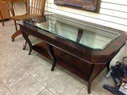 The table is rock solid, with 2 massive drawers. Lot Ethan Allen Glass Top Coffee Table