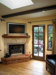 Corner Fireplace With Tv Above Design