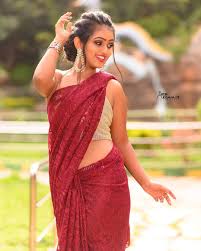 The beautiful lady was eye catchy in red transparent saree paired with a black embroidery blouse. Kannada Model Sonu Surabhi In Red Saree Pics South Indian Actress