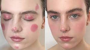 makeup artist uses blush stick for eyes