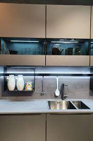 Illuminated Smoked Glass Cabinets Are