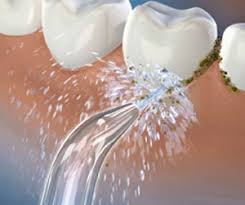 dental floss vs waterpik water