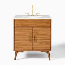 The style, constructed of solid hardwood, has two functional drawers and a porcelain sink and countertop with space for bathroom. Mid Century Single Bathroom Vanity 31 5 Acorn