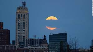 The name of a current phase, an approximate percent of an illuminated surface of the moon visible from the earth, and moon's age. Pink Moon When To See The Supermoon In April 2021 Cnn