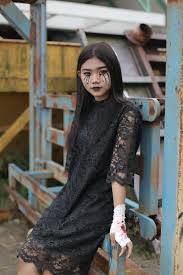 black lace dress with creative makeup