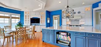 Deep rich blue cabinets with white farmhouse sink, white subway tile backsplash and white walls/ceiling. 31 Awesome Blue Kitchen Cabinet Ideas Luxury Home Remodeling Sebring Design Build