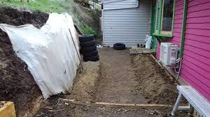 Earthship Retaining Wall From Old Tyres