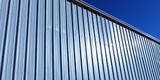 install metal siding over plywood