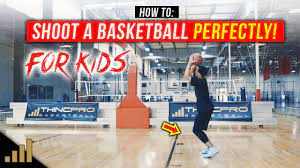 shoot a basketball perfectly for a kid