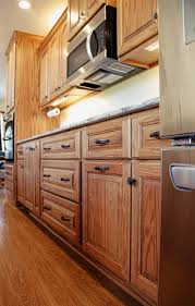 custom red oak kitchen with cambria