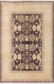 hand knotted wool brown rug