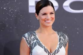 Gina carano is an american actress and her popularity really skyrocketed after she was a part of a series called the mandalorian. Gina Carano Biography Age Husband Feet Mma Ufc Poster Next Fight