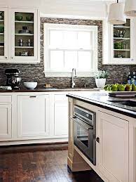 For a traditional kitchen, choose medium brown cabinets and travertine backsplash, if you're looking for an elegant style, white shaker cabinets are the better option. Kitchen Decorating And Design Ideas Backsplash Kitchen White Cabinets Gray Kitchen Backsplash White Kitchen Cabinets