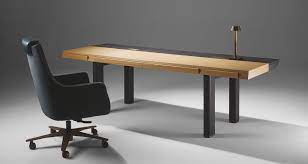 That's why we have a wide range of tables in different shapes, colors and materials, to make sure. Promemoria A Large Writing Desk Made In Different Wood Essences