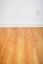how to remove wood floor adhesive from