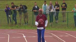 woman shatters 100 meter dash record