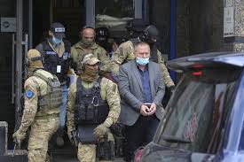 The unconditional and safe return of all refugees and displaced persons and unhindered access to them by humanitarian aid organisations Eu Police Arrest Kosovo War Veterans Leader Raid Offices