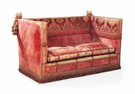 This style is one of the earliest sofa styles. A Crimson Red Silk Velvet And Damask Knole Sofa