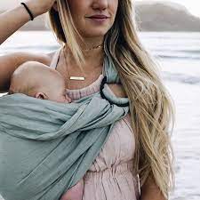 This ring sling starts at under $50, which means it falls on the more affordable end of the price spectrum. We Love This Wildbird Ring Sling It Would Go Perfectly With Our Organic Seafoam Baby Headwrap Baby Wrap Carrier Baby Sling Carrier Baby Sling Wrap