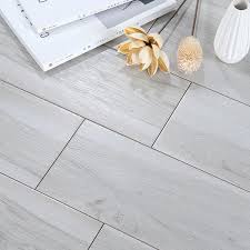grey wood look effect floor tiles