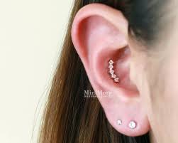 A conch piercing is located in the center part of the ear—aka the area with the most room—and because of its placement, it's one of the most customizable the inner conch piercing is when a hole is punctured right through the middle of the ear to make way for a stud. Cz Curved Bar Piercing Inner Conch Piercing Cartilage Etsy