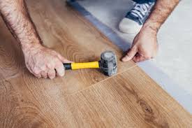 how to install laminate flooring over
