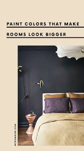 Contrasting colors like a whitewashed ceiling and an accent wall painted with dusty laurel by behr make this lofted bedroom feel larger. 6 Paint Colors That Make A Room Look Bigger Small Room Paint Color Small Bedroom Paint Colors Small Bedroom Colours